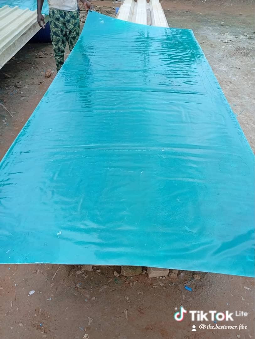 Flat teal fibre glass sheet, used for tank lamination and fibre fabrication